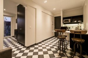 Kuchyň nebo kuchyňský kout v ubytování Apart Hotel B