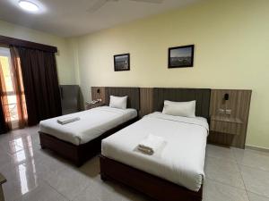 Letto o letti in una camera di ROYAL HOTEL