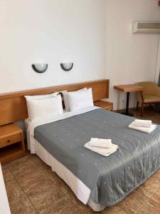 Postel nebo postele na pokoji v ubytování Flamingo Beach Hotel