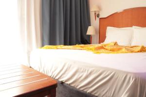 Ένα ή περισσότερα κρεβάτια σε δωμάτιο στο Suiti Art