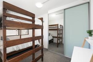 Postel nebo postele na pokoji v ubytování Chilling Bayside Waterfront + 5 fotografií