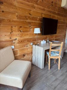 TV a/nebo společenská místnost v ubytování Patio di Fiori