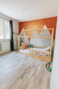 a bedroom with two bunk beds with teddy bears at Villa Perle Atlantique in La Vallée +10 photos