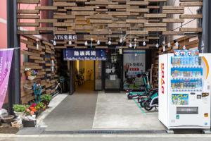 an entrance to a store with a sign on it at 難波民泊301 in Osaka