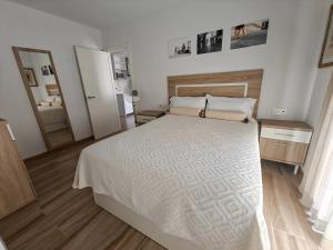 Ένα ή περισσότερα κρεβάτια σε δωμάτιο στο Casa Albendiz