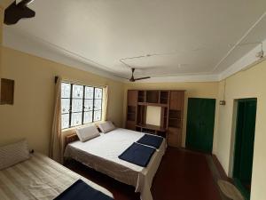 Ένα ή περισσότερα κρεβάτια σε δωμάτιο στο JMS Holiday homes