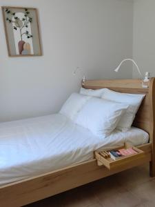 Ένα ή περισσότερα κρεβάτια σε δωμάτιο στο Little Kristi