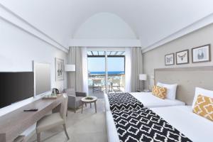 Steigenberger Resort Alaya Marsa Alam - Red Sea - Adults Friendly 16 Years Plus客房内的一张或多张床位