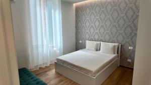 Ένα ή περισσότερα κρεβάτια σε δωμάτιο στο Nikitta Suite