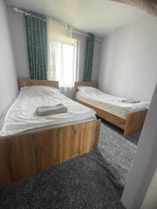 Postel nebo postele na pokoji v ubytování CBT1 Hotel
