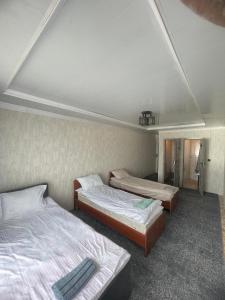 Postel nebo postele na pokoji v ubytování CBT1 Hotel