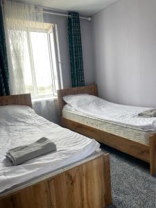 Postel nebo postele na pokoji v ubytování CBT1 Hotel