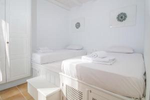 Postel nebo postele na pokoji v ubytování Villa Loka