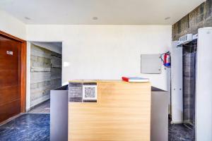 Kuchyň nebo kuchyňský kout v ubytování Hotel O Mannat