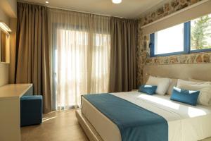 Una cama o camas en una habitación de Villa Pollux 19 fotos más