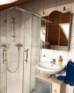 Ένα μπάνιο στο Ferienwohnung Tannhausen