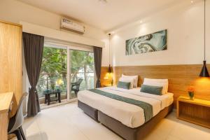 Ένα ή περισσότερα κρεβάτια σε δωμάτιο στο Eiffel Suites - Kammanahalli