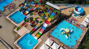an overhead view of a water park with a water slide at Спа-готель ПОЛО-МЕДЛАЙФ in Kremenchuk