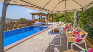 Bazén v ubytování Villa Gamor Frigiliana by Ruralidays nebo v jeho okolí