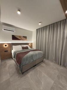 En eller flere senge i et værelse på Costa Blu mare