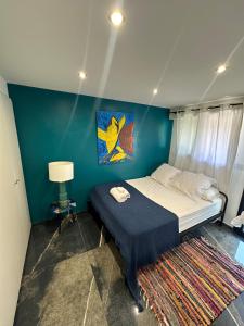 Uma cama ou camas num quarto em T3 luxe vue mer