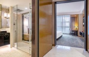 Voodi või voodid majutusasutuse Lyhn International Hotel Chengdu Taikoo Li toas