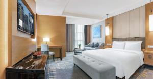 Voodi või voodid majutusasutuse Lyhn International Hotel Chengdu Taikoo Li toas