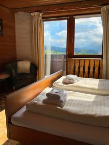 Postel nebo postele na pokoji v ubytování Hotel Wildrose