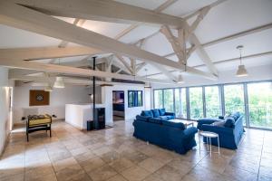 Μια τηλεόραση ή/και κέντρο ψυχαγωγίας στο Bastide de Cordes sur Ciel - Piscine chauffée & Parc