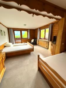 Postel nebo postele na pokoji v ubytování Hotel Wildrose