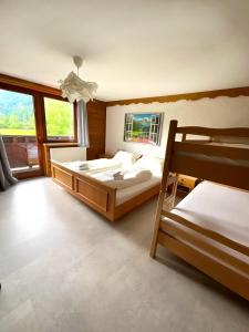 Postel nebo postele na pokoji v ubytování Hotel Wildrose