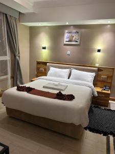 Voodi või voodid majutusasutuse Enkishon Resort toas