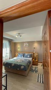 Voodi või voodid majutusasutuse Enkishon Resort toas