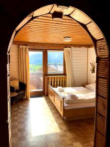 Postel nebo postele na pokoji v ubytování Hotel Wildrose