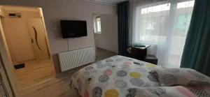 Postel nebo postele na pokoji v ubytování Studio Ultracentral cu balcon