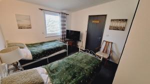 Postel nebo postele na pokoji v ubytování Forest Retreat Sleeps 4 2 Bed Parking