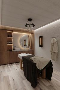 a bathroom with a sink and a mirror at The SOMM Hotel & Spa, Autograph Collection in Woodinville