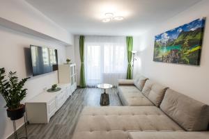 Μια τηλεόραση ή/και κέντρο ψυχαγωγίας στο Apartament Lucas Sighișoara
