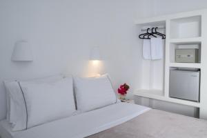 Postel nebo postele na pokoji v ubytování Selini Ηotel
