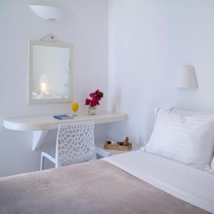 Postel nebo postele na pokoji v ubytování Selini Ηotel