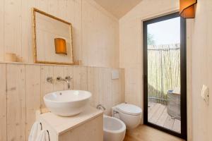 Koupelna v ubytování Beach Lodge In Tuscan Maremma