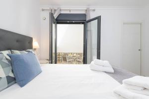 Posteľ alebo postele v izbe v ubytovaní Nueva 22 Suites in Nerja by Solaga Holiday Homes