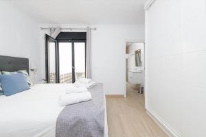 Posteľ alebo postele v izbe v ubytovaní Nueva 22 Suites in Nerja by Solaga Holiday Homes