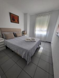 Ένα ή περισσότερα κρεβάτια σε δωμάτιο στο Spectacular Sea views 2 bedrooms in Villa Marina