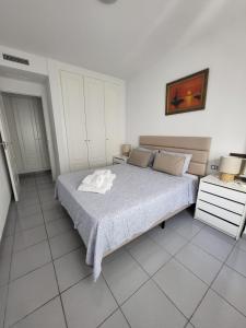 Ένα ή περισσότερα κρεβάτια σε δωμάτιο στο Spectacular Sea views 2 bedrooms in Villa Marina