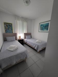 Ένα ή περισσότερα κρεβάτια σε δωμάτιο στο Spectacular Sea views 2 bedrooms in Villa Marina