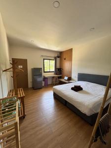 Кровать или кровати в номере Lom Phangan Studio