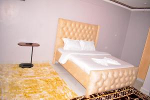 Ένα ή περισσότερα κρεβάτια σε δωμάτιο στο Imani apartment