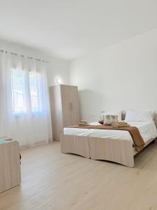 Postel nebo postele na pokoji v ubytování Casa Ferrante