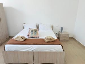 Postel nebo postele na pokoji v ubytování Casa Ferrante